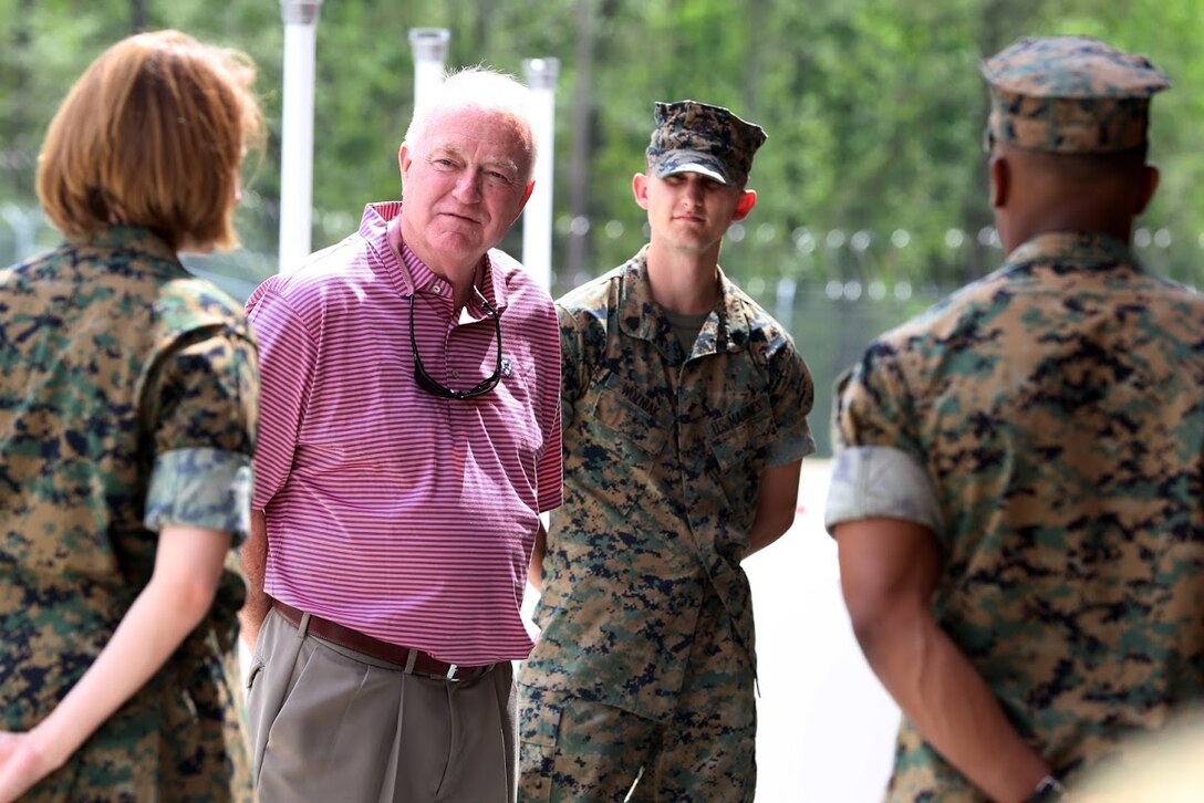 Marine Mark Carter interacts with Marines at Marine Corps Air Station Cherry Point, N.C., April 14, 2017. Carter was accompanied by Will Lewis, mayor of Havelock, during a tour of Marine Air Support Squadron 1 facilities. Marines assigned to MASS-1, Marine Air Control Group 28, 2nd Marine Aircraft Wing, received a rare opportunity as they had the chance to speak to a Marine who once walked in their shoes as a sergeant assigned to the same squadron years ago. Carter is the general manager of Wells Global. (U.S. Marine Corps photo by Sgt. N.W. Huertas/Released)