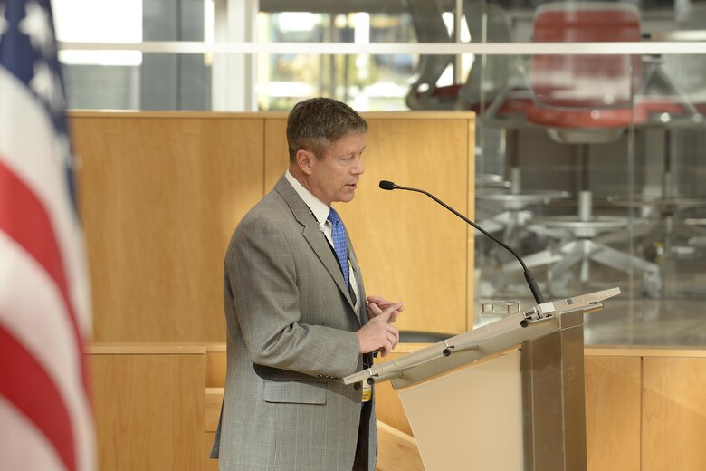 Jim Knowlton, the athletic director at the U.S. Air Force Academy, speaks from the stage of Polaris Hall, April 10, 2017, during the National Association of Collegiate Directors of Athletes Spring Symposium, hosted by the Academy’s Athletic Department. During the two-day symposium, athletic directors from several U.S. colleges met to discuss a shared priority: reducing sexual assault and learning innovative ways to teach leadership and develop character among their athletes. (U.S. Air Force photo/Darcie Ibidapo)