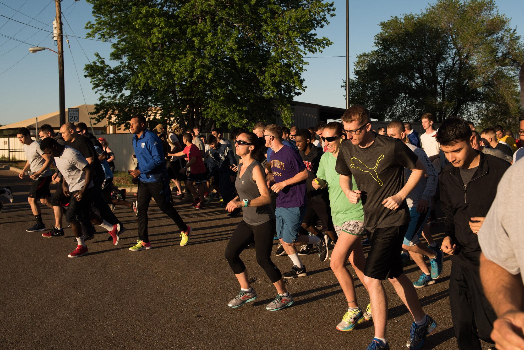 Members of Cannon Air Force Base, NM, start running during the Arbor Day and Earth Day 5K fun run at Unity Park, April 19, 2017. The run was just one event in the day in celebration of Arbor Day for the base, which was decreed to be April 19 by Col. Douglas Gilpin, 27th Special Operations Mission Support Group commander. (U.S. Air Force photo by Staff Sgt. Michael Washburn/Released)