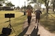 Two participants in the Arbor Day and Earth Day 5K fun run cross the finish line at Unity Park on Cannon Air Force Base, NM, April 19, 2017. The fastest time for men was 17:59 and the fastest time for women was 23:29. (U.S. Air Force photo by Staff Sgt. Michael Washburn/Released)