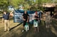 (Middle left) Ilan Serrano, and (middle right) Tayler Wyttenbach, pose for a picture after finishing the Arbor Day and Earth Day 5K fun run as the fastest male and female at Unity Park on Cannon Air Force Base, NM, April 19, 2017. Serrano finished the race in 17:59 and Wyttenbach finished in 23:29. (U.S. Air Force photo by Staff Sgt. Michael Washburn/Released)