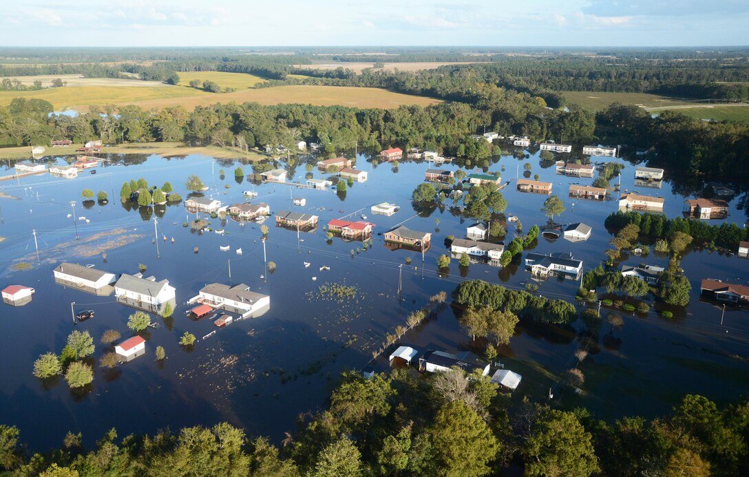 An aerial view of flooding in Princeville, North Carolina, one of the hardest-hit areas from Hurricane Matthew which dumped anywhere from 6-20 inches of rain across large areas of the state despite making landfall south of the area. Severe flooding from the storm caused $4.8 billion in damages to homes, businesses and infrastructure in North Carolina alone. (Photo: Courtesy Hank Heusinkveld, Public Affairs Specialist, USACE-Wilmington.)