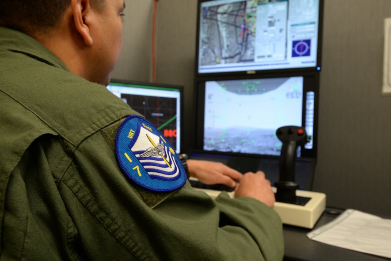 Master Sgt. Alex, one of the first Enlisted Pilot Initial Class students, operated the controls for a simulator during the Remotely Piloted Aircraft Fundamentals Course at Joint Base San Antonio-Randolph, Texas, April 19, 2017. Alex is assigned to Undergraduate Remotely Piloted Training Class 17-10, 558th Flying Training Squadron. (U.S. Air Force photo by Tech. Sgt. Ave I. Young) The Undergraduate Remotely Piloted Training Class 17-10 patch is worn by all the students and was designed with the master sergeant insignia to represent the Enlisted Pilot Initial Class students. Master Sgt. Alex, one of the first Enlisted Pilot Initial Class students, operated the controls for a simulator during the Remotely Piloted Aircraft Fundamentals Course at Joint Base San Antonio-Randolph, Texas, April 19, 2017. 
