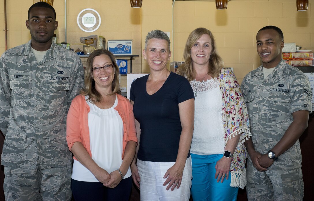 Dyess Soul Fire Café volunteers host a tour for Barbara Bussiere, center, Annie Benson, right, and Michelle Mott at Dyess Air Force Base, Texas, April 17, 2017. Bussiere accompanied her husband, Maj. Gen. Thomas Bussiere, 8th Air Force commander, to tour Dyess facilities and visit with Airmen and their families to learn more about how they support the Dyess and Air Force missions. (U.S. Air Force photo by Airman 1st Class Katherine Miller)