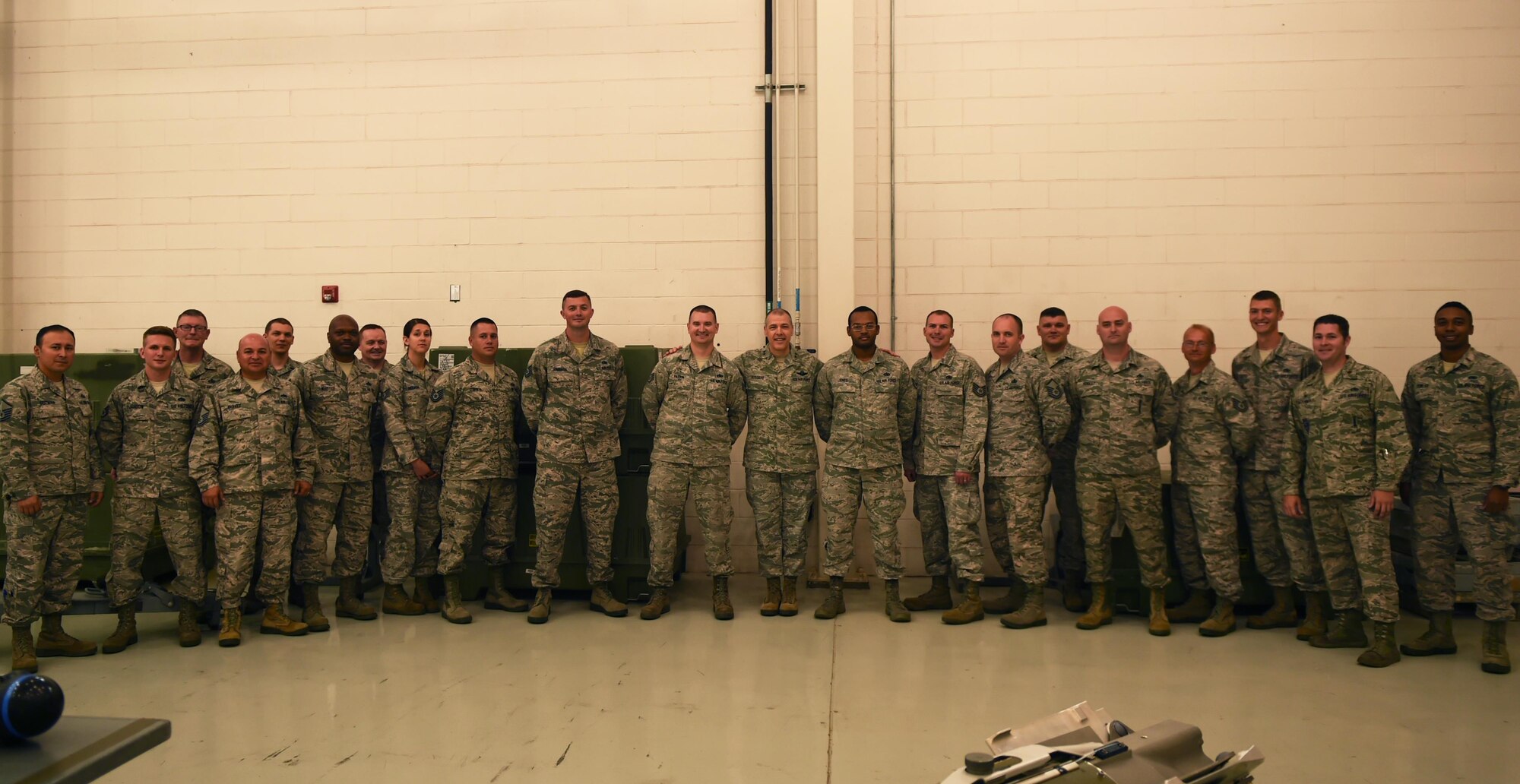 U.S. Air Force Airmen assigned to the 7th Munitions Squadron meet with Maj. Gen. Thomas Bussiere, 8th Air Force commander, during his walk-through of the 7th MUNS facility on Dyess Air Force Base, Texas, April 17, 2017. Bussiere was given the opportunity to view several types of munitions that are built and loaded by 7th MUNS and used by Dyess' B-1B Lancers and C-130J Super Hercules. (U.S. Air Force photo by Airman 1st Class Emily Copeland)