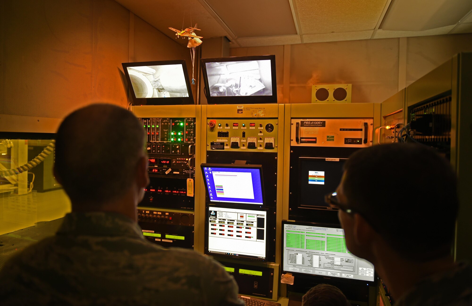 U.S. Air Force Maj. Gen. Thomas Bussiere, 8th Air Force commander and Col. David Berthe, 7th Medical Group commander, watch a test cell demonstration at Dyess Air Force Base, Texas, April 18, 2017. Bussiere spent three days meeting and recognizing Airmen, touring base facilities, and gaining knowledge on how Dyess supports the mission of the Mighty Eighth. (U.S. Air Force photo by Airman 1st Class Emily Copeland)
