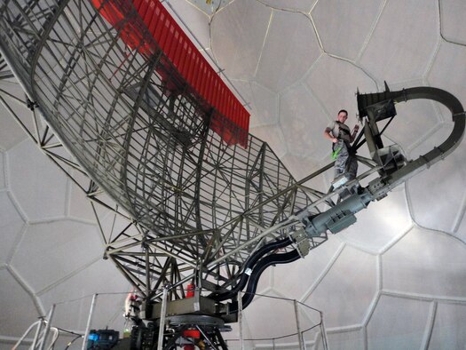 Staff Sgts. Nicholas Metros, left, and Christopher Kelly, 84th Radar Evaluation Squadron, conduct Common Air Route Surveillance Radar (CARSR) antenna measurements during a radar site evaluation at Benton, Pennsylvania. (U.S. Air Force photo/Lt. Col. Frank Azaravich)