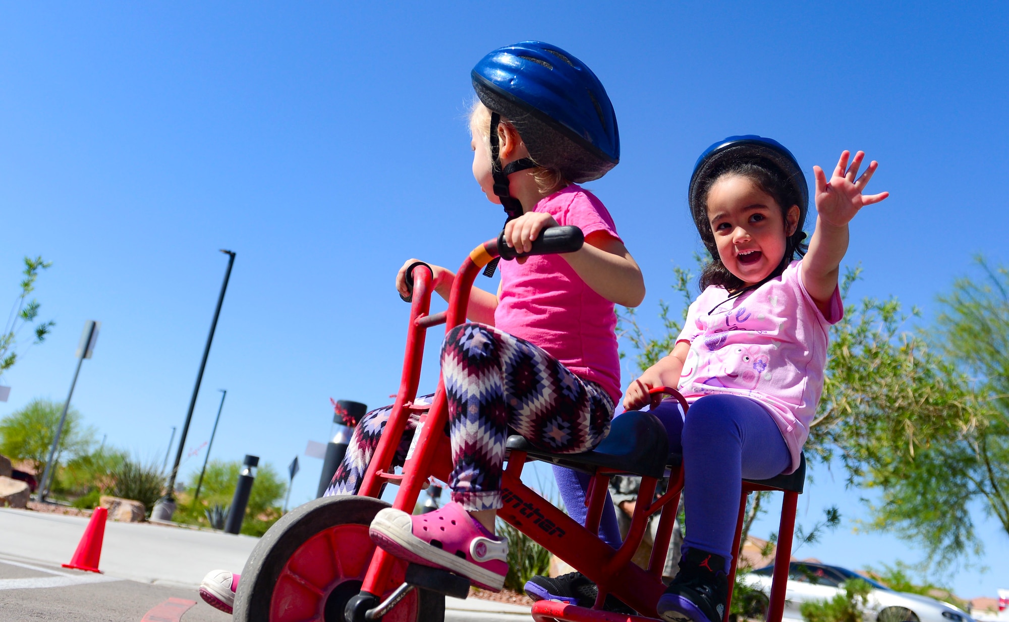 Children participate in the trike-a-thon at the Nellis Child Development Center on Nellis Air Force Base, Nev., April 14, 2017. The trike-a-thon was one of several activities held in April to celebrate the Month of the Military Child. (U.S. Air Force photo by Airman 1st Class Nathan Byrnes/Released)