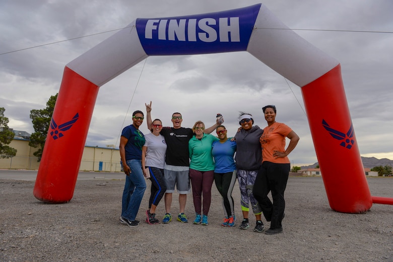 Master Resilience Trainers from Nellis and Creech Air Force Bases pose for a group photo after the 5k Color Run/Walk, April 7, 2017, at Nellis Air Force Base, Nev. MRTs are Department of Defense certified trainers for resiliency. They instruct resiliency techniques to military service members and their families. (U.S. Air Force photo by Airman 1st Class Andrew D. Sarver/ Released)



