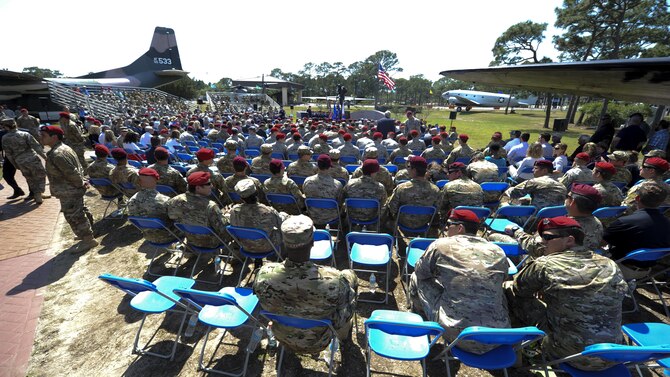 Hundreds of Airmen attend a dual Air Force Cross ceremony April 20, 2017, at Hurlburt Field, Fla. Two Airmen were simultaneously awarded the service’s highest medal for valorous action in combat. Retired Master Sgt. Keary Miller, from the Air National Guard’s 123rd Special Tactics Squadron, and Chris Baradat, a former combat controller, both received Silver Stars for their actions in combat, which were upgraded after a service-wide review. (U.S. Air Force photo/Airman 1st Class Dennis Spain)