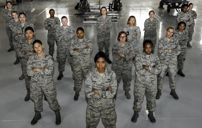 Airmen from the 57th Maintenance Group pose for a photo on March 22, 2017, at Nellis Air Force Base, Nev. The mission of the Airmen assigned to the 57th Maintenance Group is to bear the responsibility of ensuring that flying programs on Nellis AFB can accomplish their own missions at all times. (U.S. Air Force photo by Senior Airman Kevin Tanenbaum)