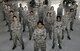 Airmen from the 57th Maintenance Group pose for a photo on March 22, 2017, at Nellis Air Force Base, Nev. The mission of the Airmen assigned to the 57th Maintenance Group is to bear the responsibility of ensuring that flying programs on Nellis AFB can accomplish their own missions at all times. (U.S. Air Force photo by Senior Airman Kevin Tanenbaum)