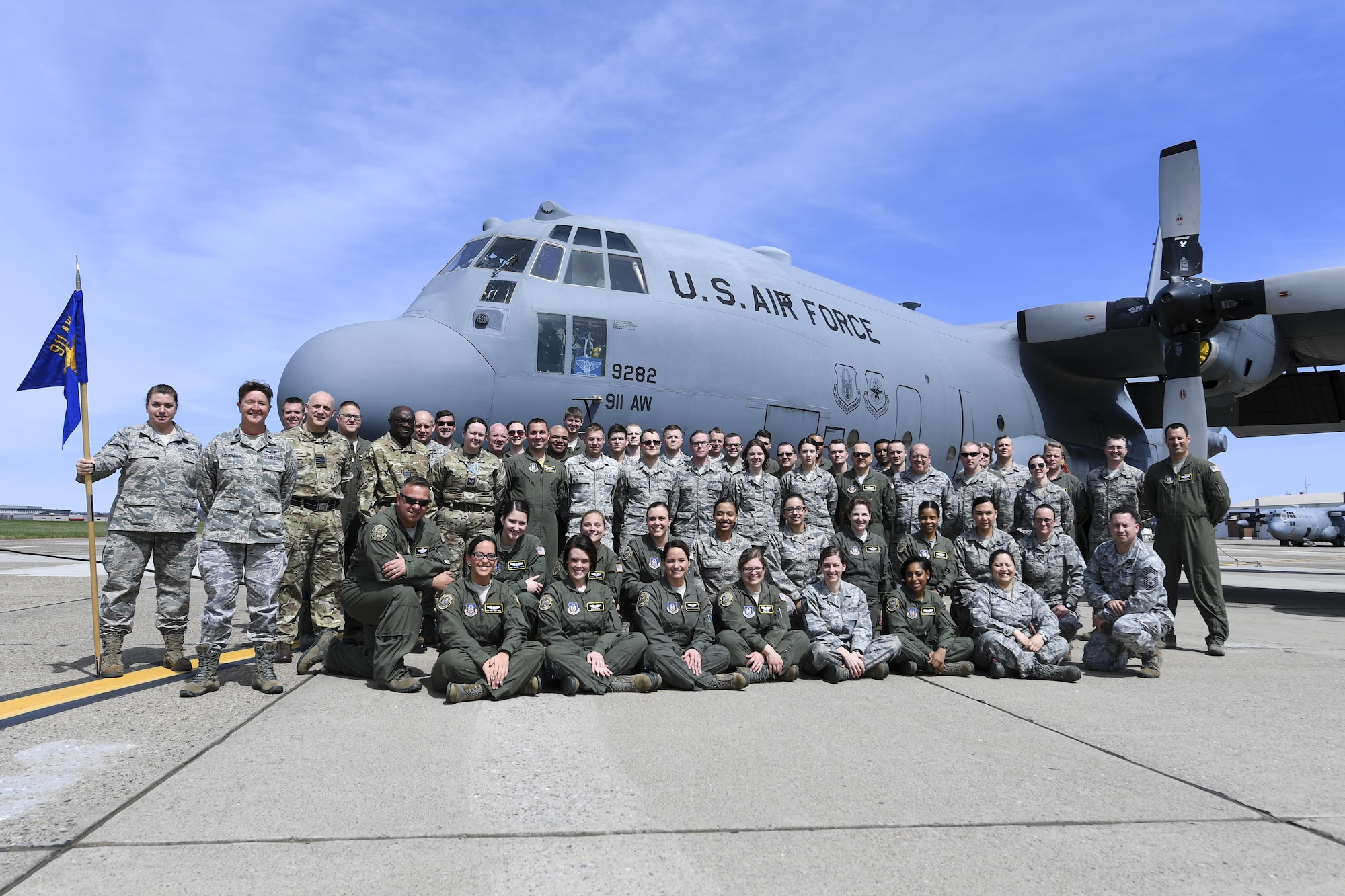 Three members of the 612th Squadron with the Royal Air Force Medical Reserves pose with members of the 911th Aeromedical Evacuation Squadron April 9, 2017, at the Pittsburgh International Airport Air Reserve Station, Pa. The purpose of this visit was to give the Scottish members a look at what a typical 911th Airlift Wing unit training assembly was like, as well as to get to know members of the 911th AES. (U.S. Air Force photo by Senior Airman Beth Kobily)