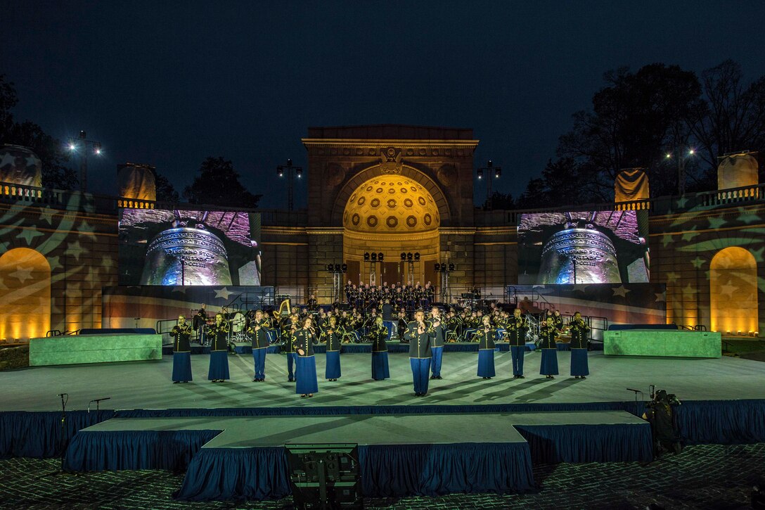 Soldiers rehearse for a public concert hosted by the U.S. Army Military District of Washington at the Women in Military Service for America Memorial at Arlington National Cemetery, Va., April 20, 2017. The show honors and celebrates the contributions of soldiers, first responders, nurses and teachers. DoD photo by EJ Hersom