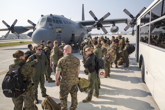 U.S. Marines with Marine Attack Squadron (VMA) 311 board a C-130 Hercules during an exercise to Kunsan Air Base, Republic of Korea, from Marine Corps Air Station Iwakuni, Japan, April 12, 2017. VMA 311 is participating in Exercise MAX THUNDER 17, an operational readiness exercise built to promote interoperability between U.S. and ROK forces. This annual exercise helps to promote stability in the Asia-Pacific region. (U.S. Marine Corps photo by Lance Cpl. Carlos Jimenez)