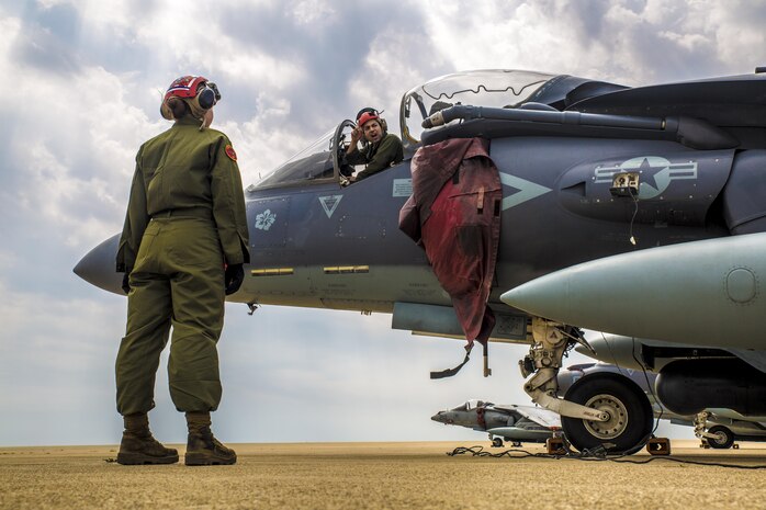 U.S. Marine Corps Lance Cpl. Rachel Dew and Cpl. Brent Armendariz, aviation ordnance technicians with Marine Attack Squadron (VMA) 311, work on an AV-8B Harrier during a maintenance day for Exercise MAX THUNDER 17 at Kunsan Air Base, Republic of Korea, April 14, 2017. Max Thunder is an operational readiness exercise built to promote interoperability between U.S. and ROK forces. This exercise helps to ensure the defense and security of the Asia-Pacific region. (U.S. Marine Corps photo by Lance Cpl. Carlos Jimenez)