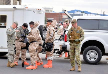 Chief Warrant Officer Two Robert Taylor, right, an evaluator from the Joint Interagency Training and Education Center (JITEC), observes as members of the Washington National Guard’s 10th Homeland Response Force (HRF) conduct training at the Spokane Readiness Center Apr. 7-9, 2017. 