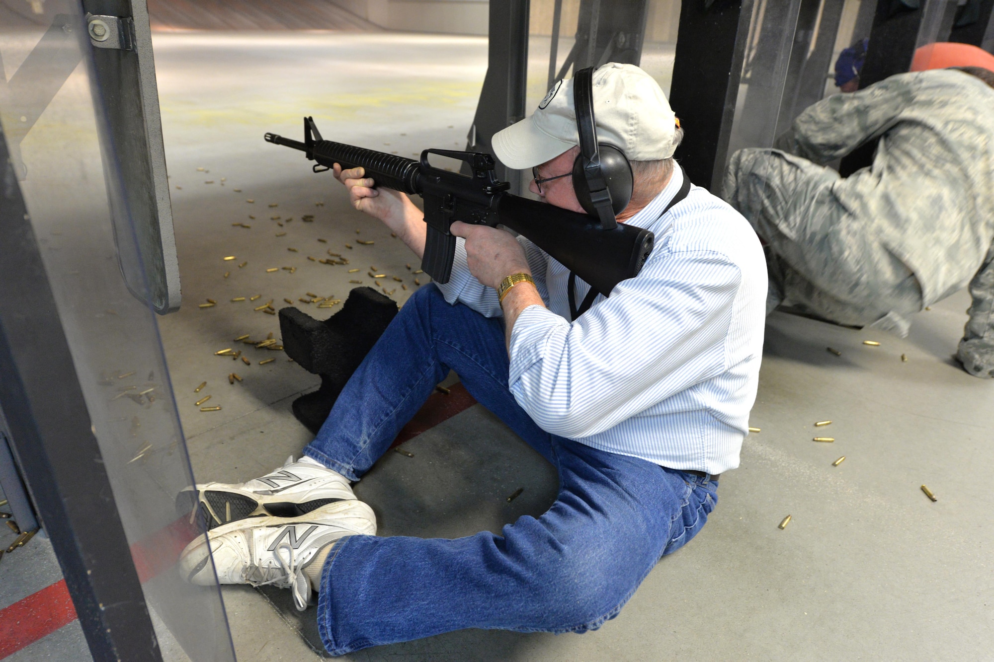 Daniel Large, 88th Communication Squadron information technology specialist, takes aim at his target during the pistol and rifle Excellence in Competition contest at the 88th Security Forces Squadron gun range, Apr. 12, at Wright-Patterson Air Force Base, Ohio. The EIC contest, conducted Air Force-wide, was open to all active duty, Guard, Reserve, retiree and civil service employees, April 3-13, 2017. (U.S. Air Force photo/Al Bright)