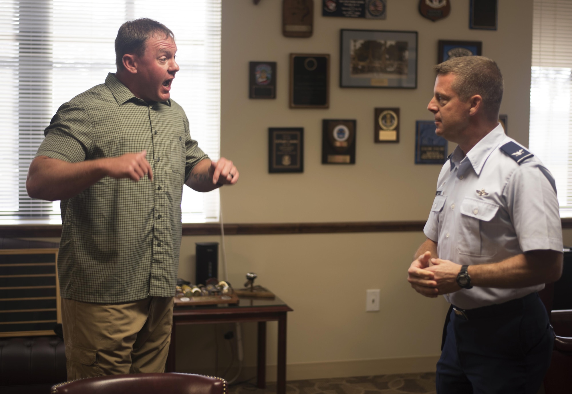 U.S. Air Force Col. Frank Amodeo, commander of the 927th Air Refueling Wing, listens to an armed gunman’s demands during an active shooter exercise at MacDill Air Force Base, Fla., April 17, 2017. The exercise’s purpose is to test the response time of security forces and other teams to an active shooter call on base. (U.S. Air Force photo by Airman 1st Class Adam R. Shanks)