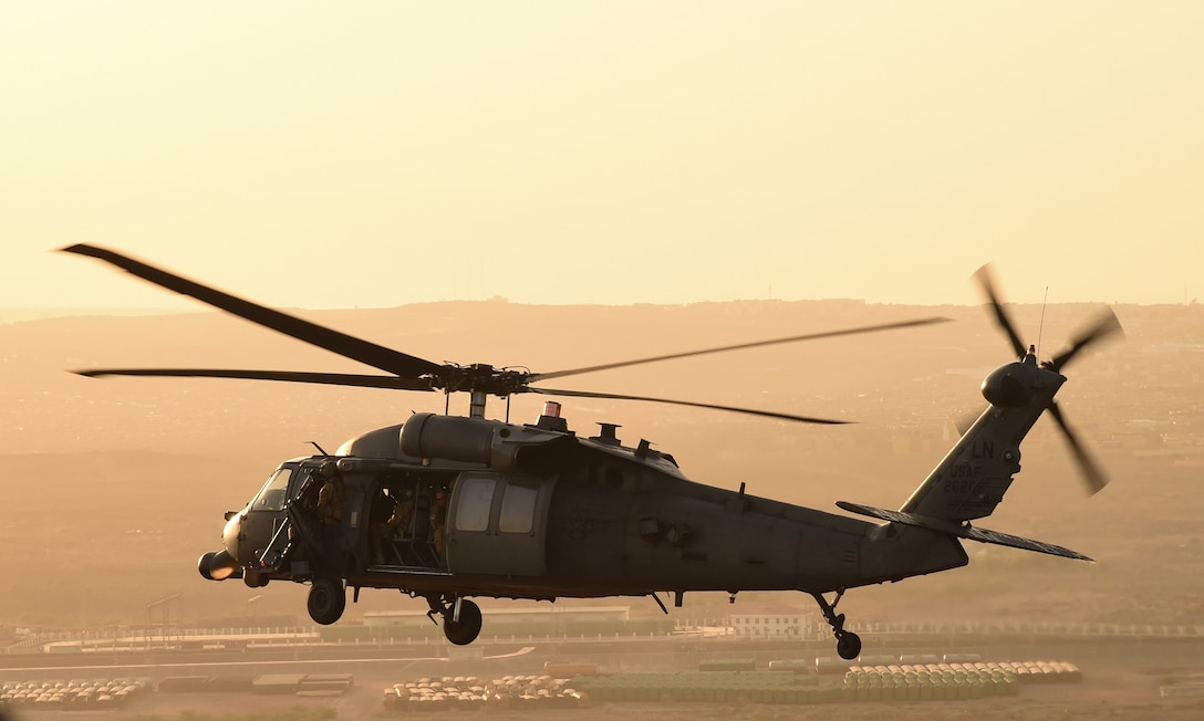 U.S. Air Force Vice Chief of Staff Gen. Stephen Wilson, Chief Master Sgt. of the Air Force Kaleth O. Wright, and members of their staff travel in an HH-60 Pave Hawks to an airfield near Camp Lemonnier, Djibouti, April 11, 2017. The General visited CJTF-HOA and other tenant commands with Wright to gain a better understanding of Air Force integration and missions in the U.S. Africa Command area of responsibility. (U.S. Air National Guard photo by Staff Sgt. Penny Snoozy)