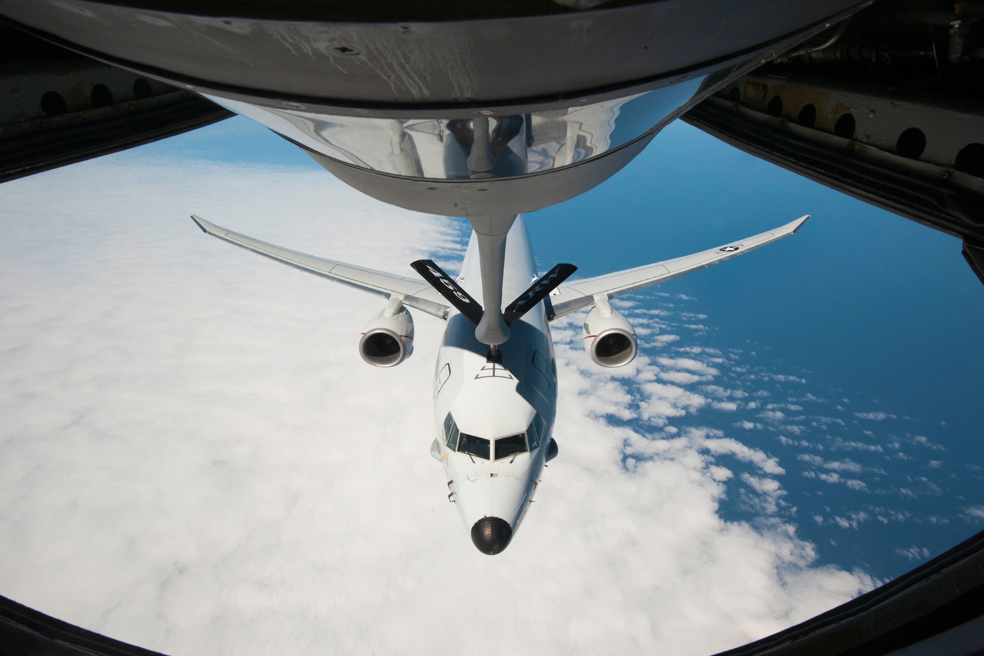 A Naval Air Systems Command P-8A Poseidon is refueled by a 459th Air Refueling Squadron KC-135R Stratotanker over the Atlantic Ocean April 13, 2017. This was the first inflight refueling of a P-8A. The P-8A is the second-ever Navy aircraft to be fitted with a receiver for aerial refueling; the first being the E-6B Mercury nearly 30 years ago. (U.S. Air Force photo/Tech. Sgt. Kat Justen)

