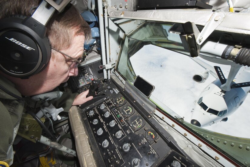 Chief Master Sgt. Frankie Rollins, 756th Refueling Squadron superintendent and boom operator, refuels a Naval Air Systems Command P-8A Poseidon over the Atlantic Ocean April 13, 2017. This was the first successful inflight refueling of the P-8A after a year of planning and coordination with NAVAIR. (U.S. Air Force photo/Tech. Sgt. Kat Justen)