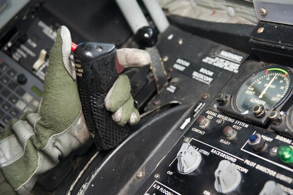 A 756th Air Refueling Squadron boom operator pulls back on the boom telescoping lever in the boom pod of a KC-135R Stratotanker during an aerial refueling of a Naval Air Systems Command P-8A Poseidon over the Atlantic Ocean April 13, 2017. This was the first inflight refueling of a P-8A. The P-8A is only the second-ever Navy aircraft to be fitted with a receiver for aerial refueling; the first being the E-6B Mercury nearly 30 years ago. (U.S. Air Force photo/Tech. Sgt. Kat Justen)

