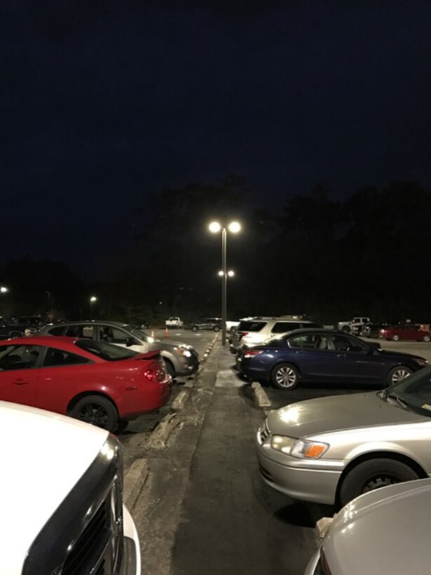Building 159’s parking lot shines brightly now due to Voluntary Protection Program initiatives that took place aboard Marine Corps Air Station Cherry Point, N.C., in January 2017. “It is critical to preserve the workforce to the fullest extent possible; everyone deserves to go home in the same shape or better than they came in to work,” said Cmdr. Amy Varney, the installation safety manager aboard the air station. In VPP, management, labor, and the Occupational Safety and Health Administration work cooperatively and proactively to prevent fatalities, injuries, and illnesses through a system focused on: hazard prevention and control; worksite analysis; training; and management commitment and worker involvement. (Courtesy photo/ Used with Permission)