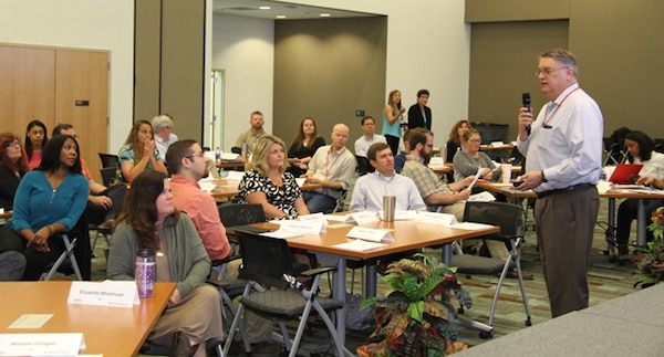 Dr. Gary Anderton, director for the Directorate of Human Capital, conducts the Mentoring Program introduction.