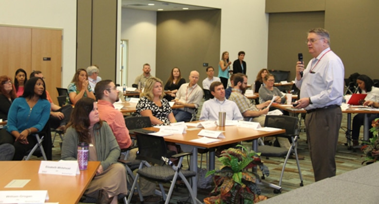 Dr. Gary Anderton, director for the Directorate of Human Capital, conducts the Mentoring Program introduction.