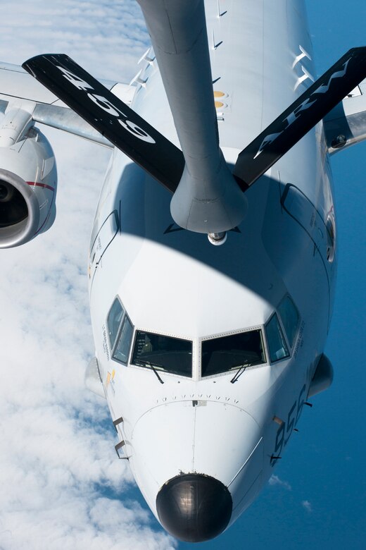 A Naval Air Systems Command P-8A Poseidon waits for the boom arm of a 459th Air Refueling Squadron KC-135R Stratotanker to make contact with its fuel receiver over the Atlantic Ocean April 13, 2017. This was the first inflight refueling of a P-8A. The P-8A is only the second-ever Navy aircraft to be fitted with a receiver for aerial refueling; the first being the E-6B Mercury nearly 30 years ago. (U.S. Air Force photo/Tech. Sgt. Kat Justen)

