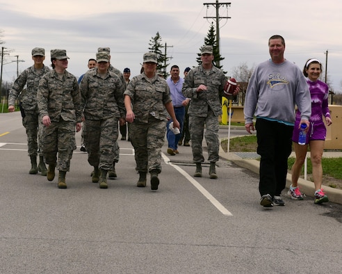 Members of the 107th Attack Wing and 914th Airlift Wing "go for a walk" to show their support of Sexual Assault Awareness & Prevention Month at the Niagara Falls Air Reserve Station, N.Y. April 11, 2017. Walks were scheduled every Tuesday during the month of April.  (U.S. Air Force photo by Peter Borys)