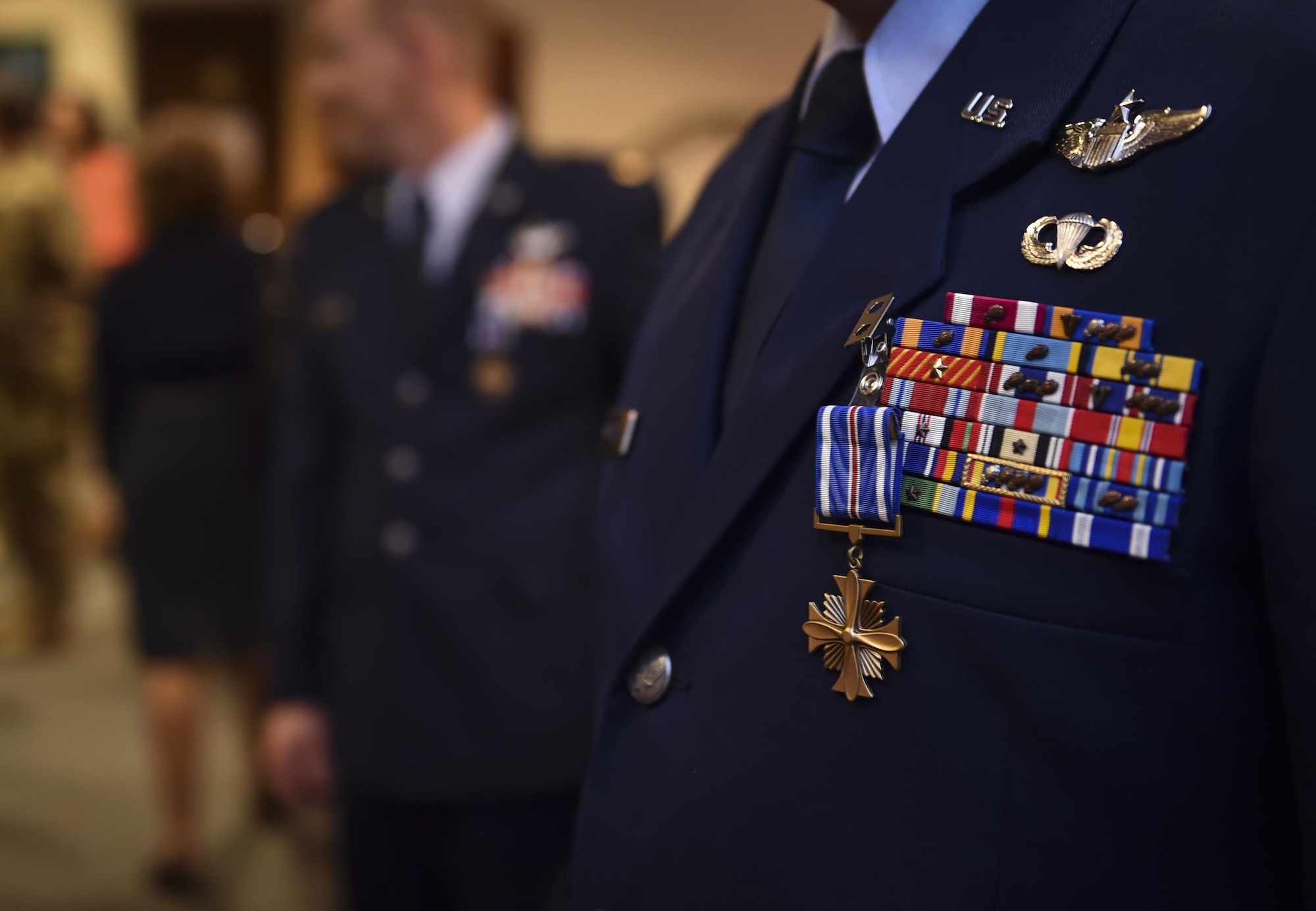 Maj. Ryan Mittelstet, Maj. Brett Cassidy and Tech. Sgt. Christopher Nin were awarded the Distinguished Flying Cross during a ceremony at Hurlburt Field, Fla., April 21, 2017. While assigned to the 8th Expeditionary Special Operations Squadron, Mittelstet, Cassidy and Nin were onboard a CV-22 Osprey conducting a mission to evacuate American citizens during a civil war in Africa. While attempting the evacuation, their aircraft was targeted and hit more than 50 times by surface-to-air fire from ground forces. (U.S. Air Force photo by Airman 1st Class Joseph Pick)