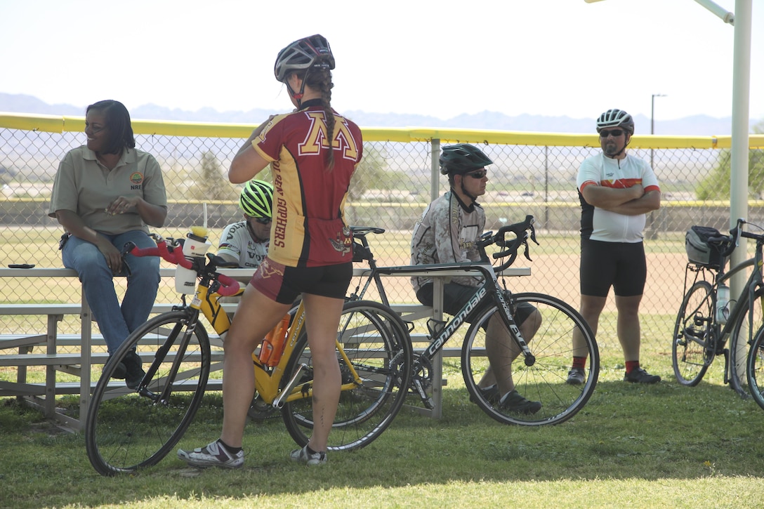 Participants for the annual Earth Day Fun Bike Ride cool off after arriving at Felix Field aboard Marine Corps Air Ground Combat Center, Twentynine Palms, Calif., April 13, 2017. Natural Resources and Environmental Affairs hosts the event annually to raise environmental awareness of Combat Center residents and the local community in the weeks leading up to Earth Day. (U.S. Marine Corps photo by Lance Cpl. Natalia Cuevas)