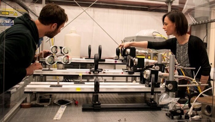 DAHLGREN, Va. - Naval Surface Warfare Center Dahlgren Division (NSWCDD) scientists Chris Von Hohenleiten and Emily Martin prepare for a laser lethality test by ensuring the optics are aligned correctly. The laser experts aligned the optics in the Navy's Laser Lethality and Development Laboratory which features an above-ground tunnel used for evaluating high energy laser weapon systems. The tunnel - crucial to gun range operations during World War II - was recently transformed into a vital new capability for testing laser technologies, NSWCDD officials announced April 21.