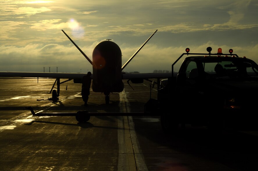 An RQ-4 Global Hawk prepares to taxi to its hangar after a successful flight March 25, 2017, on Grand Forks Air Force Base, N.D. Airmen with the 69th Maintenance Squadron performed the first Air Force-led Mobile Automated Scanner scan on this aircraft, which allowed it to continue its part in supporting the combatant commands. (U.S. Air Force photo by Senior Airman Ryan Sparks)