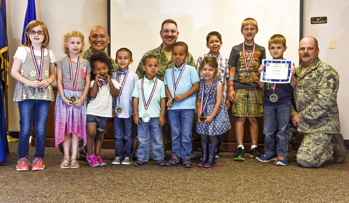 Joint Base Charleston leadership recognizes children of deployed military members at the Little Heroes Ceremony at the Airmen and Family Readiness Center, April 18, 2017. The ceremony acknowledged the sacrifice and courage children display while their parents are deployed.