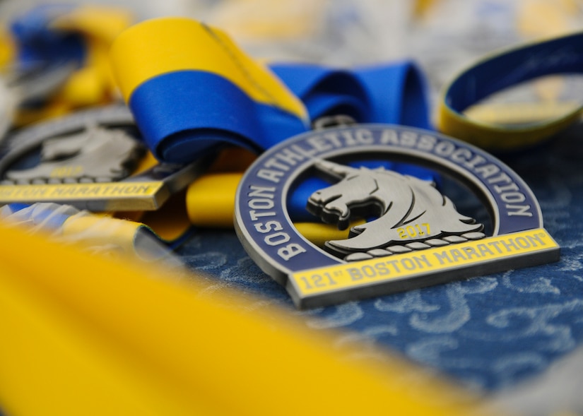 Medals for Camp Arifjan’s first Boston Marathon Shadow Run lay in wait for personnel from throughout U.S. Army Central’s area of operations to finish the 26.2-mile marathon, April 17, Camp Arifjan, Kuwait. This race shadowed the 121st Boston Marathon, and gave deployed personnel an opportunity to run in the well-known marathon. More than 300 people participated in the shadow run.  (U.S. Army photo by Sgt. Kimberly Browne, USARCENT Public Affairs)
