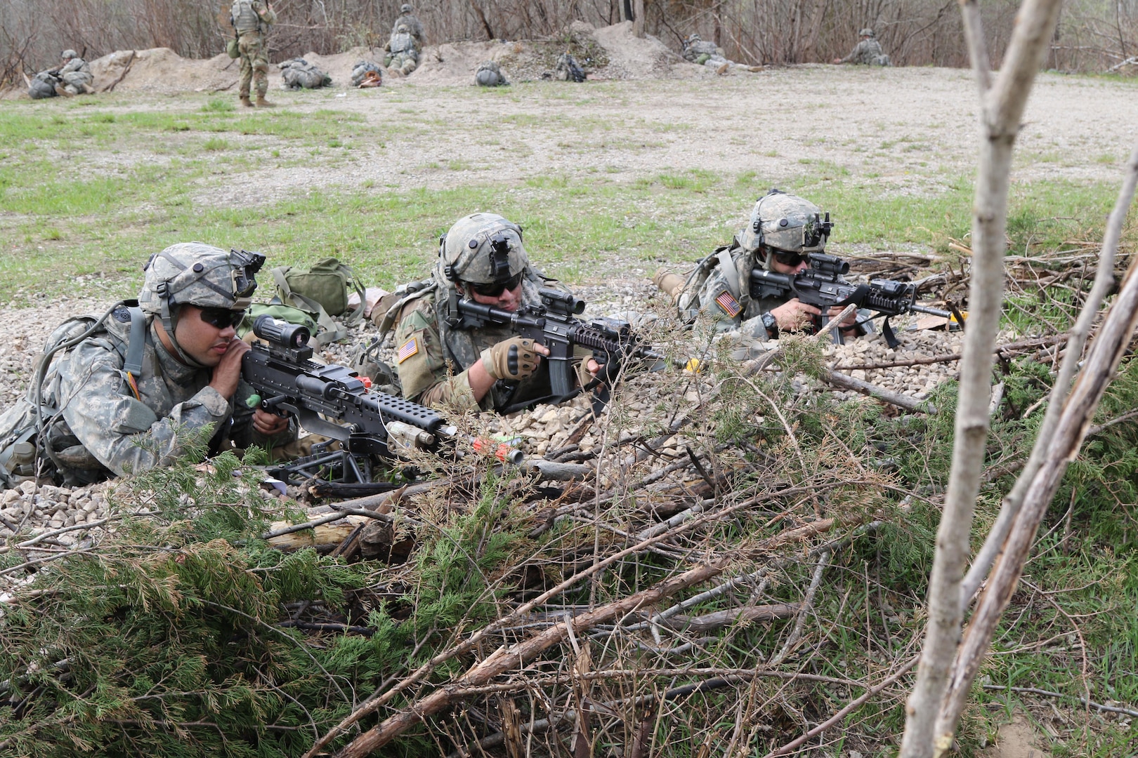 Soldiers from C Co. 1-293rd Infantry Battalion, 76th Infantry Brigade Combat Team, 'Nighthawks,' Indiana Army National Guard, pull security while bunkered down in the defense April 10, 2017, during the Spring Field Training Exercise in preparation for Joint Readiness Training Center rotation, #JRTC, later this summer. 