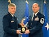 Lt. Gen. Jerry Harris, the deputy chief of staff for strategic plans, programs and requirements, presents Senior Master Sgt. Randolph Crosslin Jr. the Gen. Lew Allen Jr. Trophy for 2016, during a ceremony at the Pentagon, April 21, 2017. (U.S. Air Force photo/Wayne A. Clark)