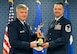 Lt. Gen. Jerry Harris, the deputy chief of staff for strategic plans, programs and requirements, presents Master Sgt. John Kelly the Gen. Lew Allen Jr. Trophy for 2016, during a ceremony at the Pentagon, April 21, 2017. (U.S. Air Force photo/Wayne A. Clark)
