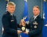 Lt. Gen. Jerry Harris, the deputy chief of staff for strategic plans, programs and requirements, presents Capt. Joseph Spada the Gen. Lew Allen Jr. Trophy for 2016 during a ceremony at the Pentagon, April 21, 2017. (U.S. Air Force photo/Wayne A. Clark)