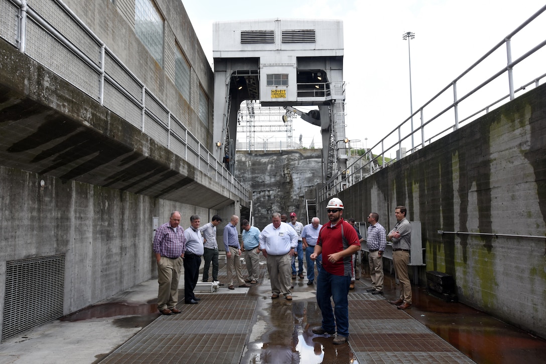 John Bell, power plant trainee, leads a group of hydropower experts attending the 40th Annual Joint Hydropower Conference in Nashville Tenn., on a tour of Old Hickory Dam in Old Hickory, Tenn., April 19, 2017.
