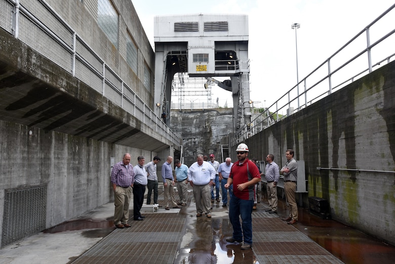 John Bell, power plant trainee, leads a group of hydropower experts attending the 40th Annual Joint Hydropower Conference in Nashville Tenn., on a tour of Old Hickory Dam in Old Hickory, Tenn., April 19, 2017.