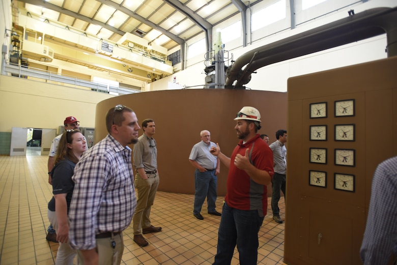 John Bell, power plant trainee, leads a group of hydropower experts attending the 40th Annual Joint Hydropower Conference in Nashville Tenn., on a tour of the Old Hickory Dam powerhouse in Old Hickory, Tenn., April 19, 2017. 
