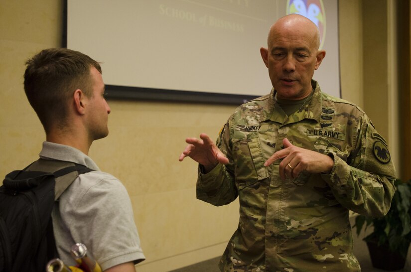 Lt. Gen. Charles D. Luckey, Chief, Army Reserve & Commanding General, U.S. Army Reserve Command, gives Simon Connolly, an ROTC cadet at Wake Forest University, some advice after his speech at the Wake Forest University School of Business in Winston Salem, North Carolina, April 18, 2017, during a Q&A session. Wake Forest's law school has used the “Conversation with...” format for campus visitors over the past decade as a way of creating a comfortable and interactive atmosphere with the students, rather than having a scripted conversation. The university's business school chose to use the same model for Luckey's visit.(U.S. Army Reserve photo taken by Sgt. Stephanie Ramirez/Released)