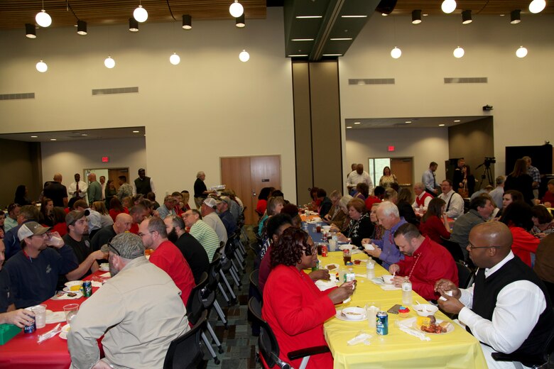 Attendees of the Executive Office/Directorate of Enterprise Operations Town Hall enjoy a crawfish and jambalaya lunch after the event.