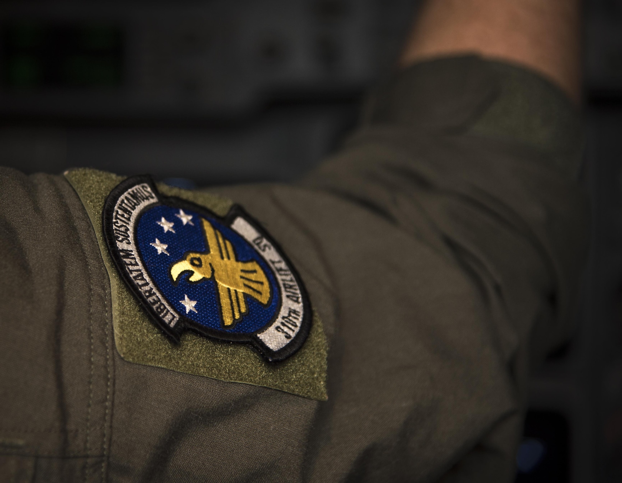 A flight engineer with the 310th Airlift Squadron performs preflight checklist procedures at MacDill Air Force Base, Fla., April 13, 2017. The flight engineers assigned to the 310th AS travel around the world with their aircraft to ensure the aircraft is mission ready at all times. (U.S. Air Force photo by Airman 1st Class Mariette Adams)