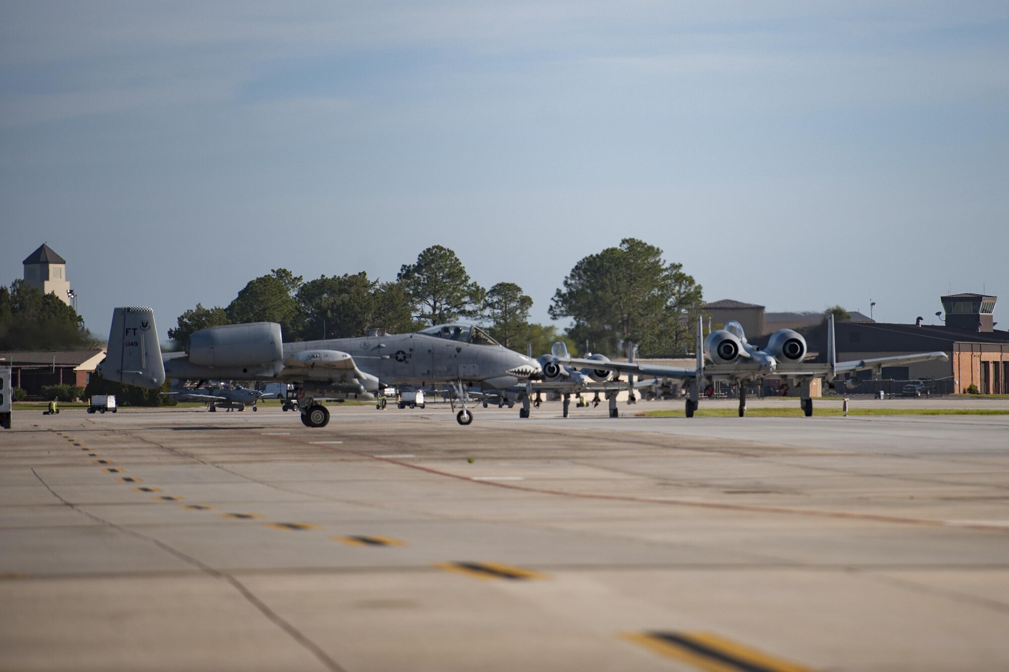 Three A-10C Thunderbolt II aircraft taxi before take-off during a natural disaster exercise, April 19, 2017, at Moody Air Force Base, Ga. The exercise tested the wing’s ability to evacuate aircraft, secure assets and respond to emergency situations in the event of a real-world natural disaster. (U.S. Air Force photo by Airman 1st Class Lauren M. Sprunk)