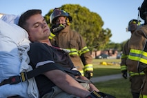 A stimulated victim acts unconscious during a natural disaster exercise, April 19, 2017, at Moody Air Force Base, Ga. The exercise tested the wing’s ability to evacuate aircraft, secure assets and respond to emergency situations in the event of a real-world natural disaster. (U.S. Air Force photo by Airman 1st Class Lauren M. Sprunk)